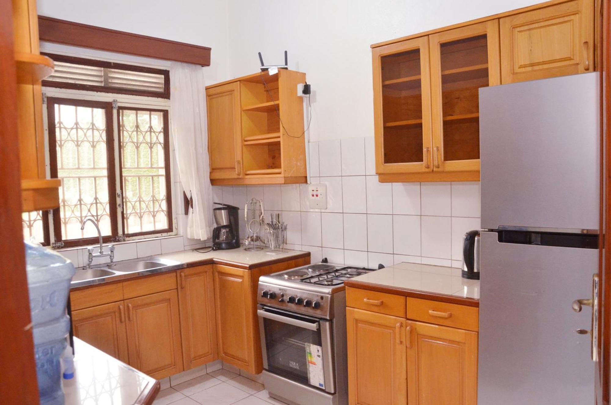 Corinya Serviced Apartments Entebbe Rum bild